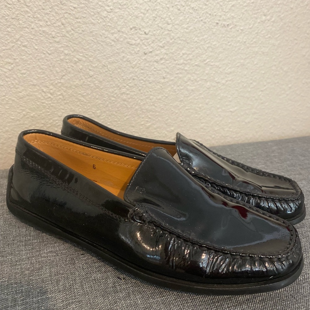 Tod’s black patent loafers